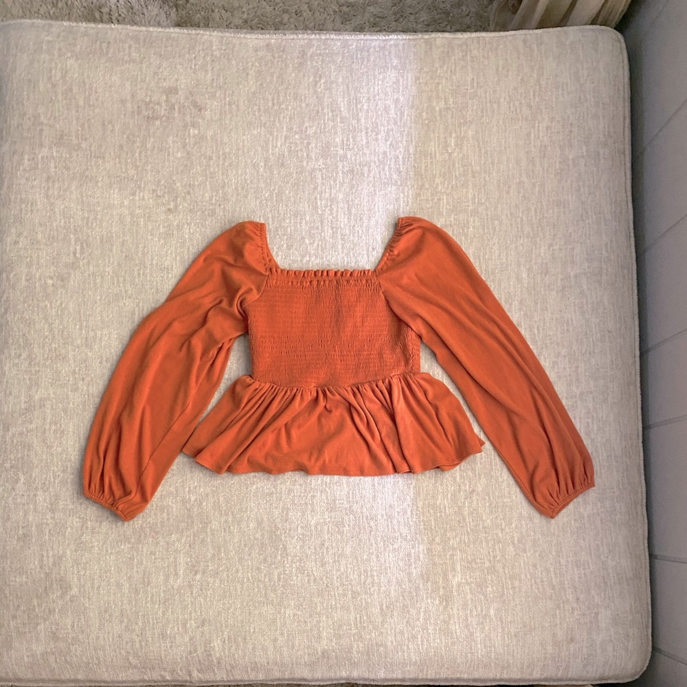 Burnt Orange off the shoulder peplum crop top